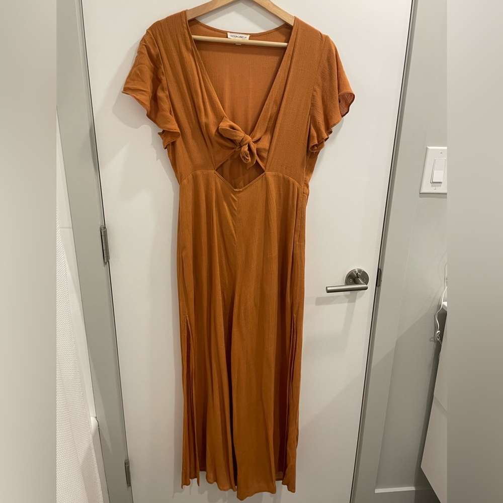 Cotton Candy LA cut out, tie front jumpsuit.  Size M